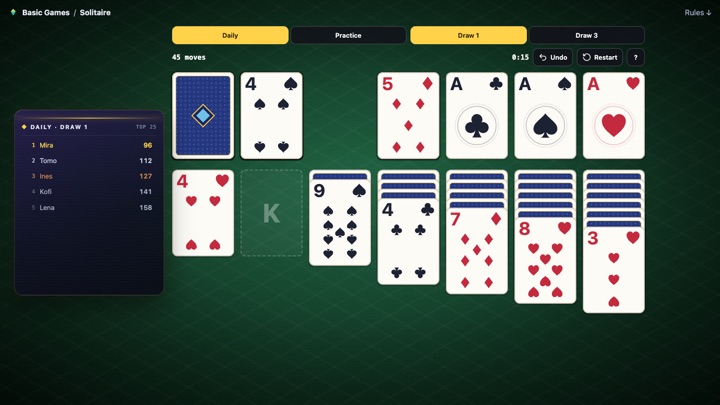 A game of Klondike solitaire in play on a green table: seven columns of cards, the stock and waste top left and four foundations top right